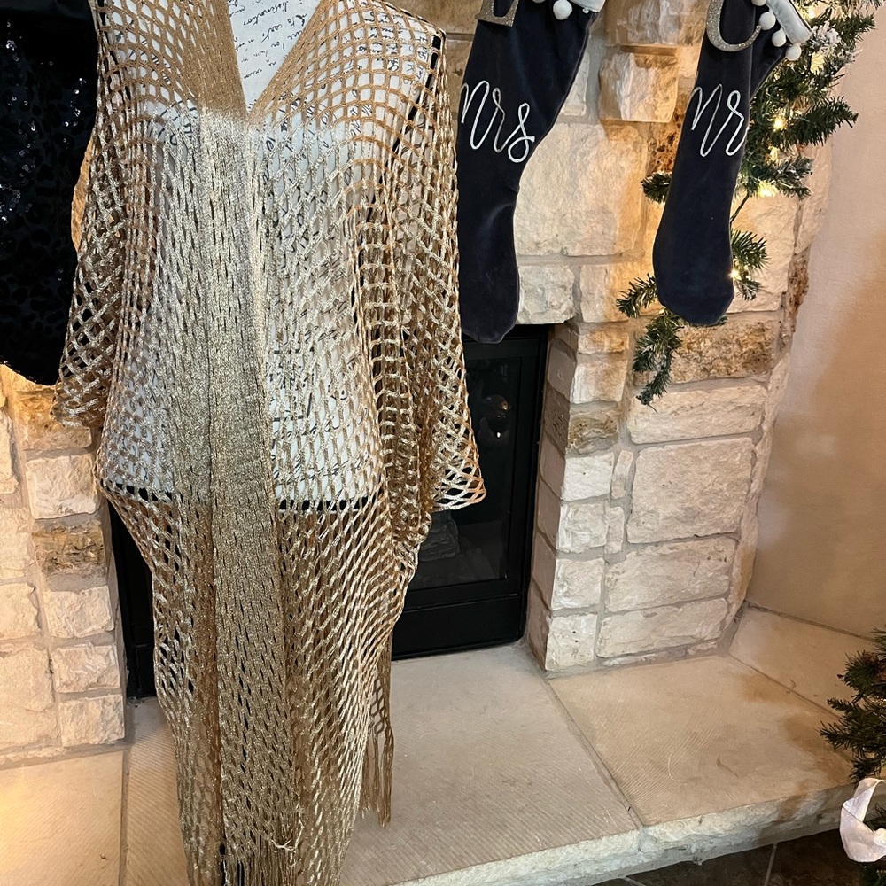 Ellie and Kate poncho can use as a cover up this summer one size - runs big.